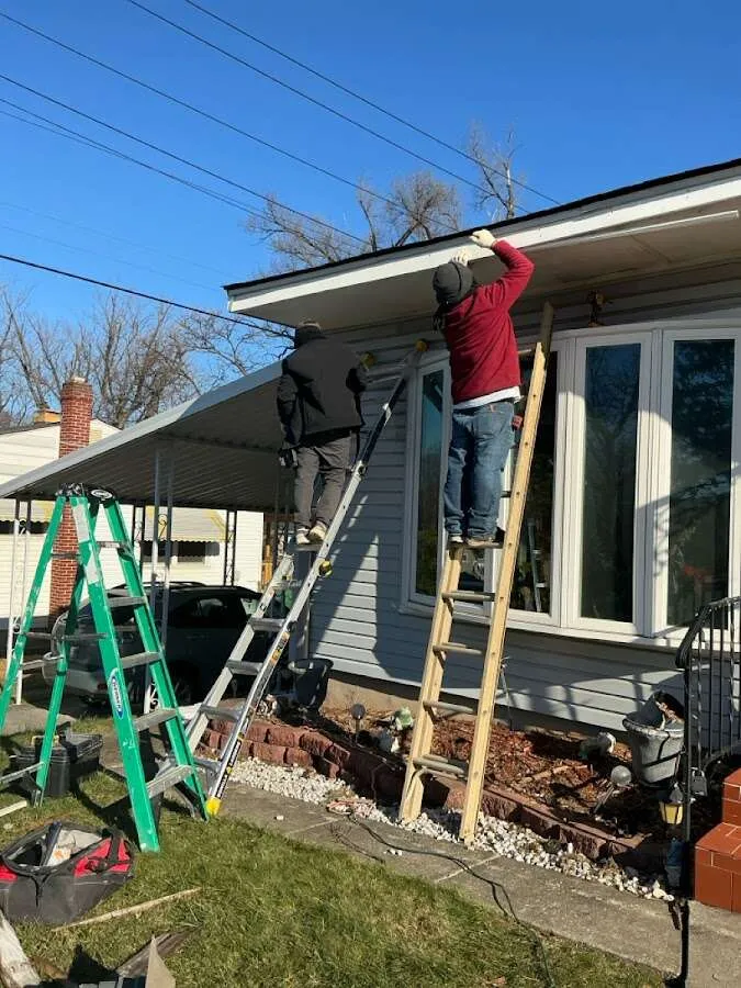 Restoration crew performing exterior repair in Warren